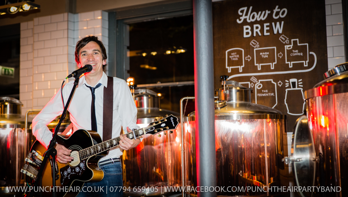 Andy performing in a bar